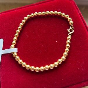 18 KARAT JAPAN GOLD BUBBLE BRACELET 6.5 INCHES